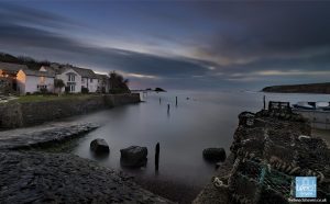 Late evening high tide at Efford Cottage